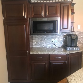 Plum Solutions LLC - Backsplash install at coffee bar, near pantry and underneath microwave - Tiling Near Me
