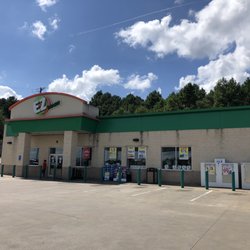 EZ-Mart - 7/21/20. Tuesday afternoon. Front exterior of the EZ as seen from the pumps! Reg Unlead $1.899/gal. Hot as all get out, out here filling up!