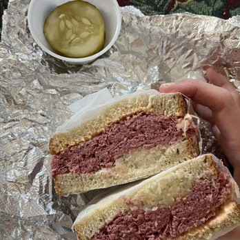 Circles On The Square - a person holding a sandwich - New American Near Me - Wilkes-Barre, Pennsylvania Circles On The Square - a person holding a sandwich - New American Near Me - Wilkes-Barre, Pennsylvania