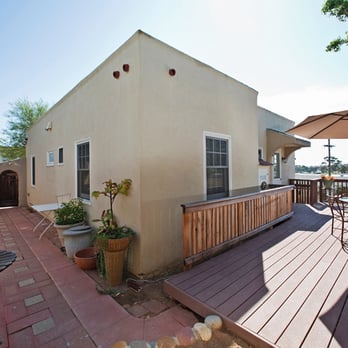 Leland Construction - a patio with tables and umbrellas - General Contractors Near Me - San Diego, California Leland Construction - a patio with tables and umbrellas - General Contractors Near Me - San Diego, California