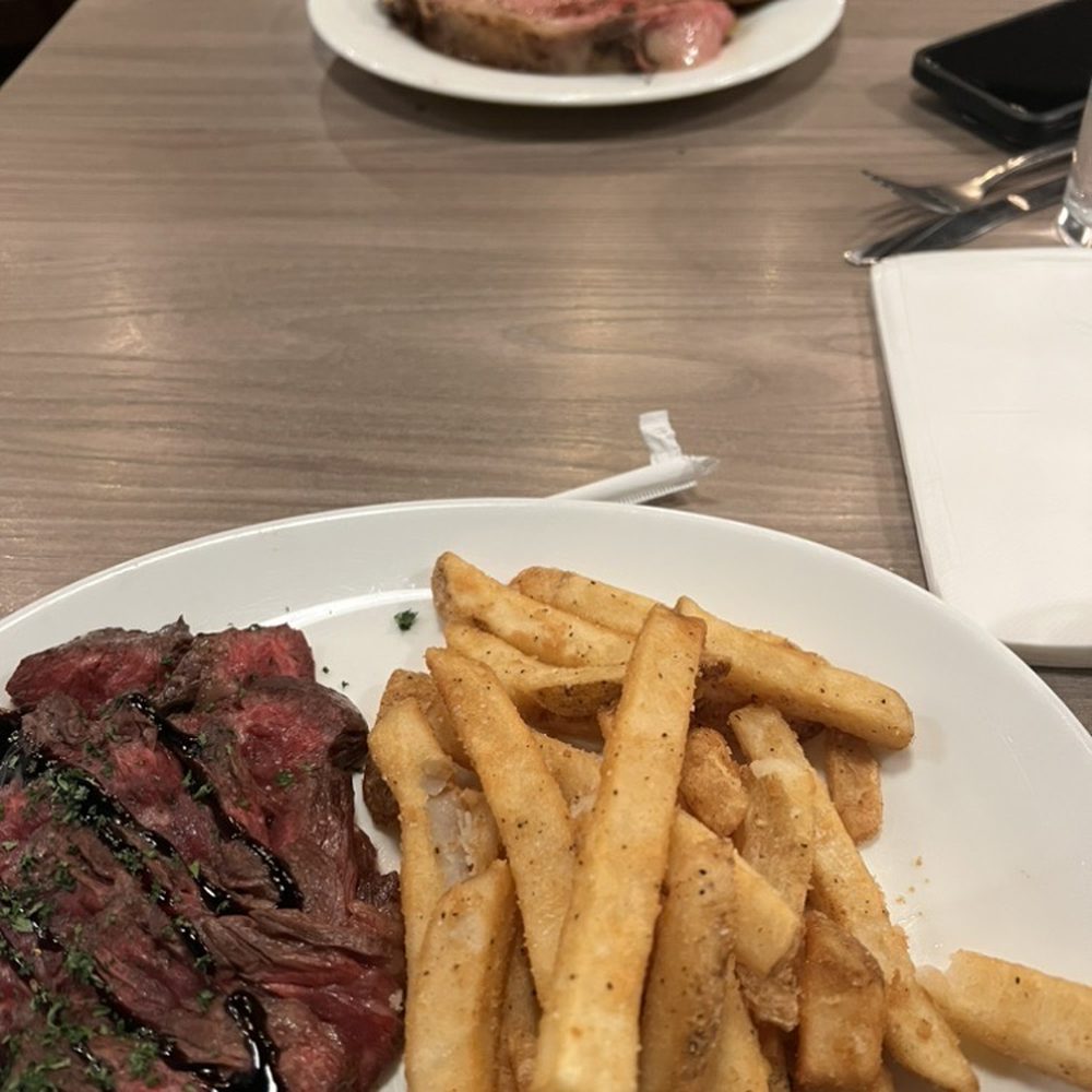 The Toast - Hanger Steak with rosemary frites and prime rib special in background. - Salad Near Me - Surprise, Arizona The Toast - Hanger Steak with rosemary frites and prime rib special in background. - Salad Near Me - Surprise, Arizona