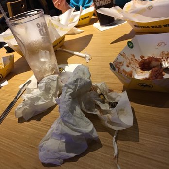 Buffalo Wild Wings - a child eating at a fast food restaurant - Chicken Wings Near Me - Ironton, Ohio