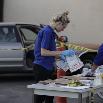 UEI College - Ontario - Criminal Justice students studying mock crime scene. - Colleges & Universities Near Me - Ontario, California UEI College - Ontario - Criminal Justice students studying mock crime scene. - Colleges & Universities Near Me - Ontario, California