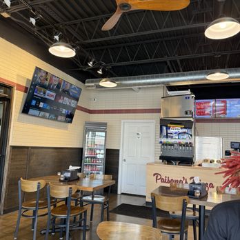 Paisano's Pizza - Interior w/ TV - Pizza Near Me - Dearborn, Michigan Paisano's Pizza - Interior w/ TV - Pizza Near Me - Dearborn, Michigan
