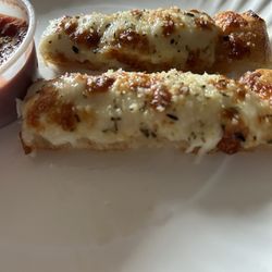 G Faz Pizza - Seasoned bread sticks.
