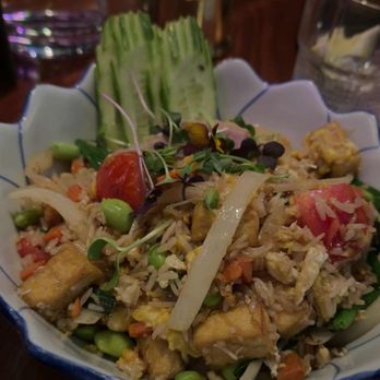 BODHI - Cute bowl of BODHI Fried Rice with fresh vegetables and fried tofu , and some fresh sliced cucumber on the side. - Thai Near Me - Indianapolis, Indiana