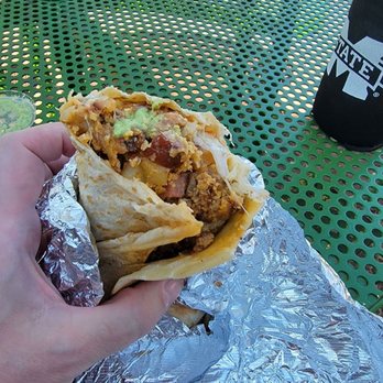 El Chile Toreado - Breakfast burrito with Luis's mix - bacon, chorizo and Polish sausage. - Mexican Near Me - Santa Fe, New Mexico El Chile Toreado - Breakfast burrito with Luis's mix - bacon, chorizo and Polish sausage. - Mexican Near Me - Santa Fe, New Mexico