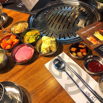Sizzle Korean Barbeque - All the snacks and fixins - Korean Near Me - Phoenix, Arizona