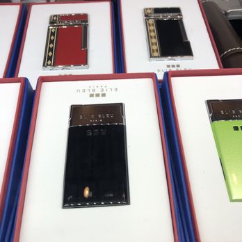 Bolivar Cigar Lounge - A few of the lighters in his case - Cigar Bars Near Me - Austin, Texas