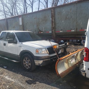 One Choice Property Preservation - a truck with a plow attached to it - Junk Removal & Hauling Near Me