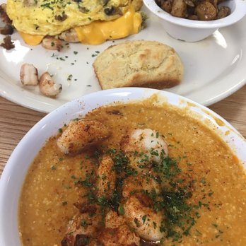 Nzinga's Kitchen - Omelette with potatoes and a biscuit and shrimp and grits. - Breakfast & Brunch Near Me - Durham, North Carolina Nzinga's Kitchen - Omelette with potatoes and a biscuit and shrimp and grits. - Breakfast & Brunch Near Me - Durham, North Carolina