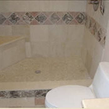 Cottrell Brothers - a bathroom with a toilet and shower - General Contractors Near Me - Tiverton, Rhode Island