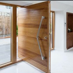 General B Contractor - Pivot entry door with sidelights offered.