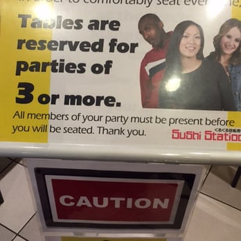 Sushi Station - Illegal treatment of customer. You can't put a sign like this up and seat 2 people when me & my two daughters (3 people) where there first. - Sushi Bars Near Me - Rolling Meadows, Illinois