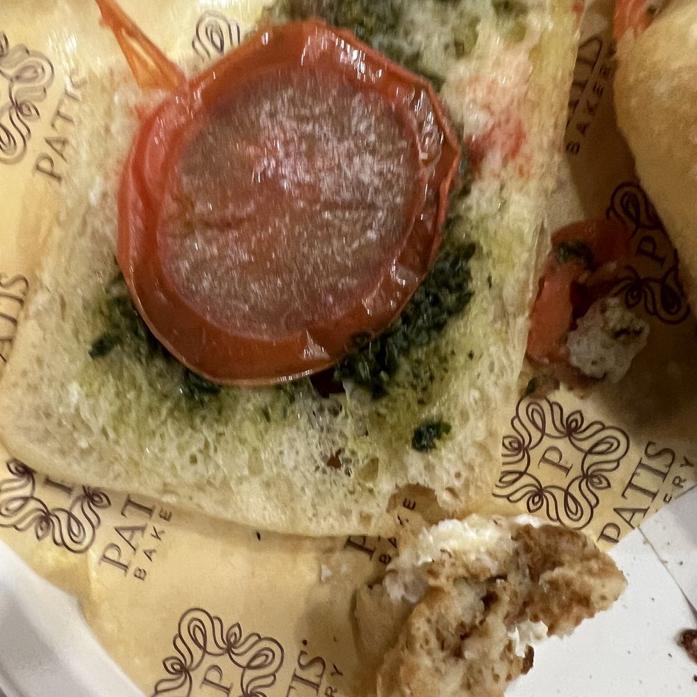 a plate of food with a sandwich and a dipping sauce a plate of food with a sandwich and a dipping sauce