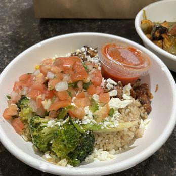 Fresh Kitchen - Brown rice and spice rice for the base, blackened chicken for protein, broccoli for veggies. I added feta cheese and salsa. - New American Near Me - Lake Mary, Florida