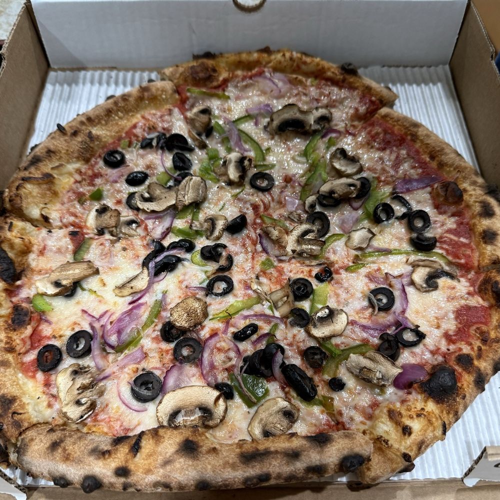 Vegan cheese, basil, bell pepper, mushrooms, olives, red onions Vegan cheese, basil, bell pepper, mushrooms, olives, red onions