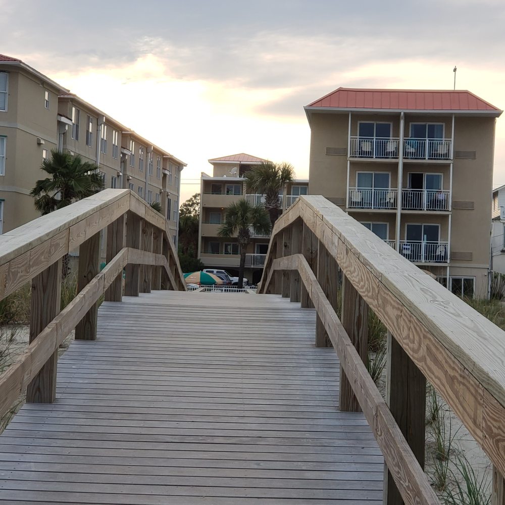 Desoto Beach Bed & Breakfast - View of the hotel when walking back after a stroll on the beach. - Bed & Breakfast Near Me - Tybee Island, Georgia Desoto Beach Bed & Breakfast - View of the hotel when walking back after a stroll on the beach. - Bed & Breakfast Near Me - Tybee Island, Georgia