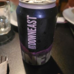 a can of beer on a table