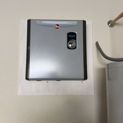 A tankless water heater with single, dual, or triple stages uses less energy as it doesn't use full capacity, providing unlimited hot water.