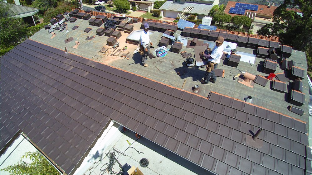 Slide of Nolanco Roofing