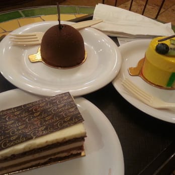 Cocola Bakery - L to R: Hazelnut Cake, Banana Crunchy Mousse, Mango & Passionfruit Mousse ($4.60 per slice) - Bakeries Near Me - San Jose, California