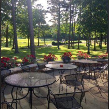 Mulligans - a patio with tables and chairs - Breakfast & Brunch Near Me - Hot Springs Village, Arkansas Mulligans - a patio with tables and chairs - Breakfast & Brunch Near Me - Hot Springs Village, Arkansas