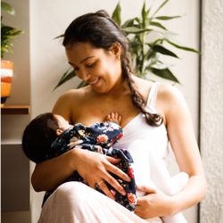 Woven - Picture of a mother holding her baby
