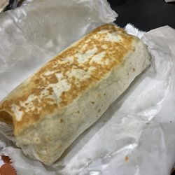 Mr. Burrito Grill - Veggie burrito: black beans, rice, corn, spinach, pineapple, onion, guacamole, tomato and chipotle sauce.