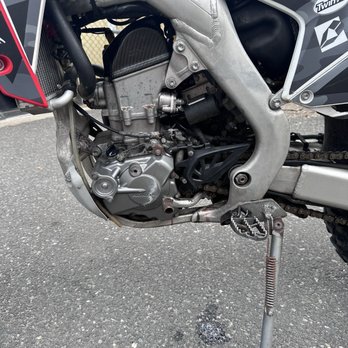 Honda of Riverhead - A wider photo of my engine covered and dripping oil onto the ground. - Motorcycle Dealers Near Me - Riverhead, New York Honda of Riverhead - A wider photo of my engine covered and dripping oil onto the ground. - Motorcycle Dealers Near Me - Riverhead, New York