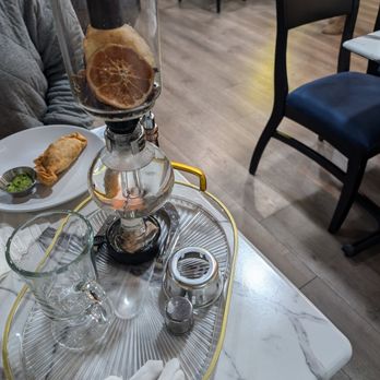 Teas Your Spirits - Alchemist elixir set up. If you have a friend used to loose leaf tea or fancy coffee set ups, bring them, they'll love this - Tea Rooms Near Me - Hilliard, Ohio