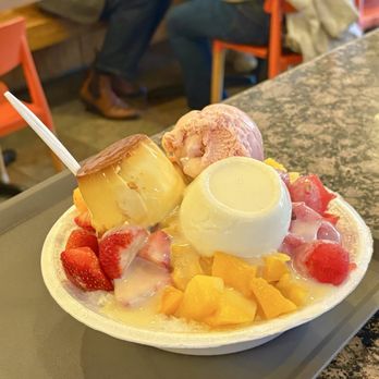 Juicy Box - S9. mixed fruit shaved ice with flan and coconut pudding - Taiwanese Near Me - Houston, Texas Juicy Box - S9. mixed fruit shaved ice with flan and coconut pudding - Taiwanese Near Me - Houston, Texas