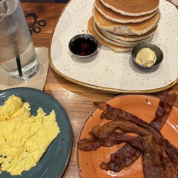 Lazy Dog Restaurant & Bar - Mountain Berry Pancakes, bacon, scrambled eggs - New American Near Me - Brea, California Lazy Dog Restaurant & Bar - Mountain Berry Pancakes, bacon, scrambled eggs - New American Near Me - Brea, California