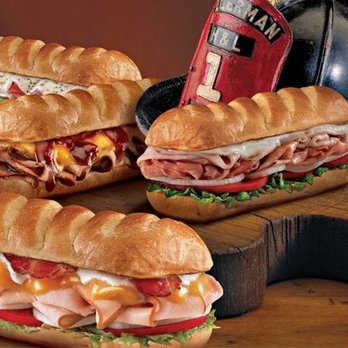Firehouse Subs - three subs on a cutting board - Sandwiches Near Me - Guelph, Ontario Firehouse Subs - three subs on a cutting board - Sandwiches Near Me - Guelph, Ontario