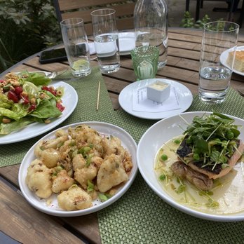 Photo of Decca - Louisville, KY, United States. Strawberry salad, cauliflower & crispy salmon (would get this again!)