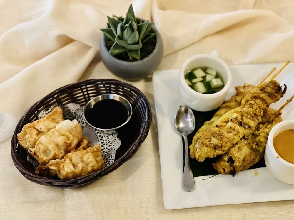 Taste The Thai and Sushi House Logo