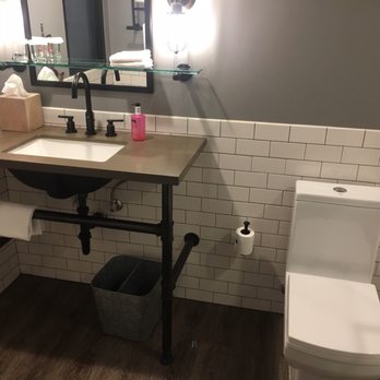 MOXY Phoenix Tempe - Nicely designed bathroom with subway tile - Hotels Near Me - Tempe, Arizona MOXY Phoenix Tempe - Nicely designed bathroom with subway tile - Hotels Near Me - Tempe, Arizona