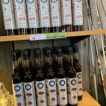 Clayton Distillery - a shelf full of bottles of wine - Distilleries Near Me - Clayton, New York Clayton Distillery - a shelf full of bottles of wine - Distilleries Near Me - Clayton, New York