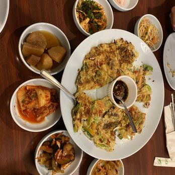 New Korea Garden - Haemul pajun - seafood pancakes - with 7 side dishes. They are so generous with side dish refills - Korean Near Me - Westmont, Illinois New Korea Garden - Haemul pajun - seafood pancakes - with 7 side dishes. They are so generous with side dish refills - Korean Near Me - Westmont, Illinois