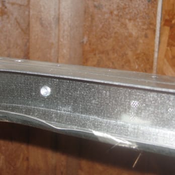 Ubaldo Garage Doors - Bent frame due to mis-installation of lock. - Garage Door Services Near Me Ubaldo Garage Doors - Bent frame due to mis-installation of lock. - Garage Door Services Near Me