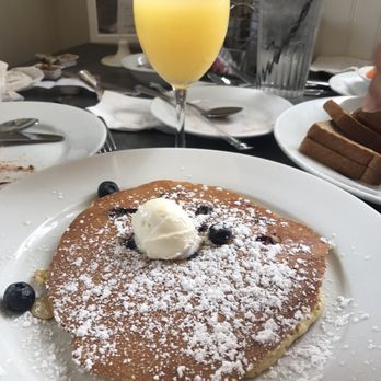 Peach Valley Cafè - Blueberry pancakes with mimosa - Breakfast & Brunch Near Me - Heathrow, Florida
