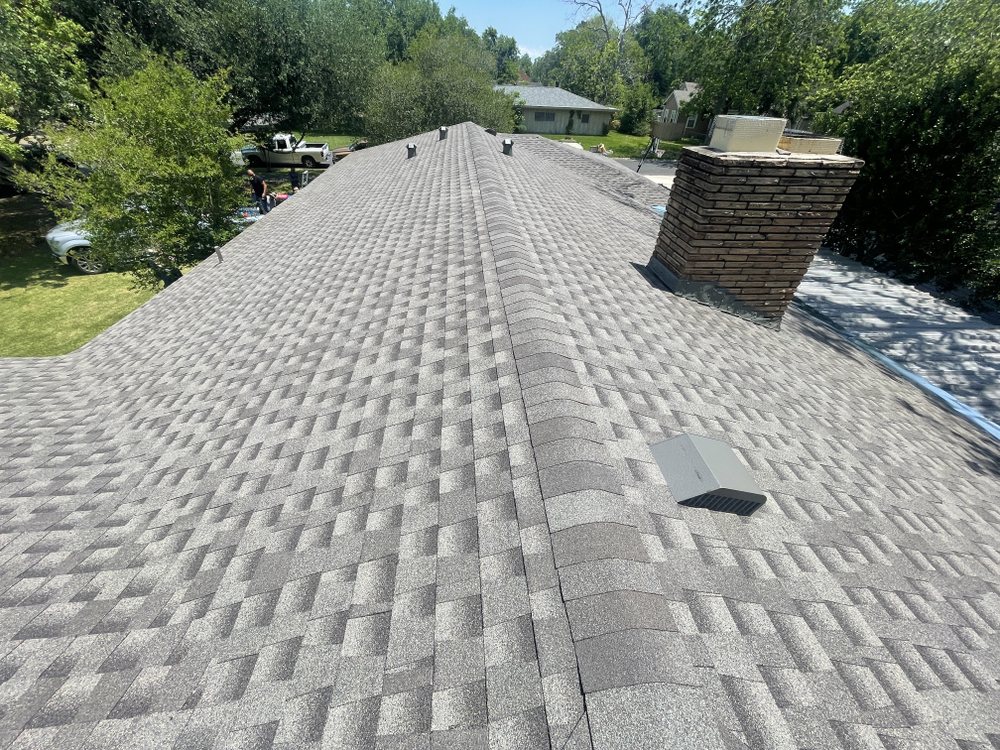 Slide of Dutchmark Roofing