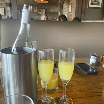 Orange County Mining Company - Cup of OJ and champagne for mimosas - Steakhouses Near Me - Orange, California