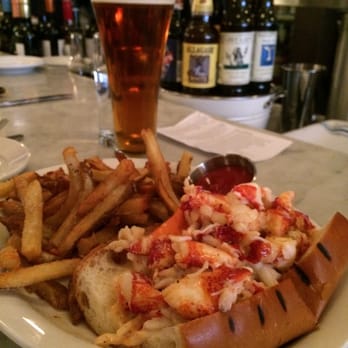 Neptune Oyster - Lobster roll and fries with honey Harpoon - Seafood Near Me - Boston, Massachusetts Neptune Oyster - Lobster roll and fries with honey Harpoon - Seafood Near Me - Boston, Massachusetts