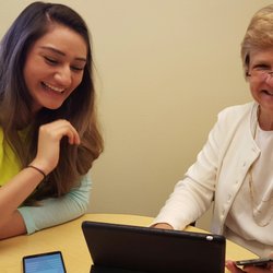 Teeniors - Teeniors coaching on a laptop!