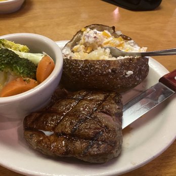 Texas Roadhouse - 6 oz sirloin steak, loaded potato and steam vegetables - Steakhouses Near Me - Wake Forest, North Carolina