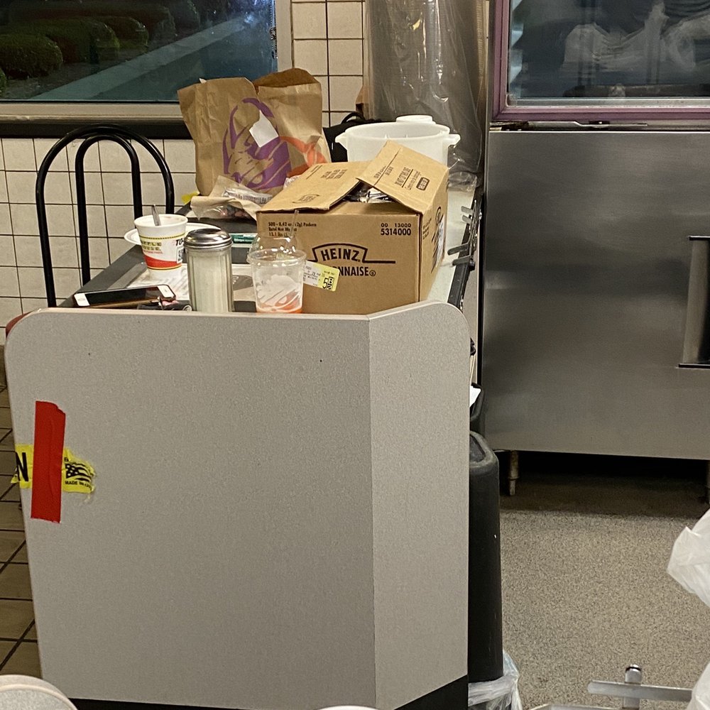 Waffle House - Old food and cups sitting on counter next to table where customers eat and flies flying all over - Breakfast & Brunch Near Me - Laurinburg, North Carolina Waffle House - Old food and cups sitting on counter next to table where customers eat and flies flying all over - Breakfast & Brunch Near Me - Laurinburg, North Carolina