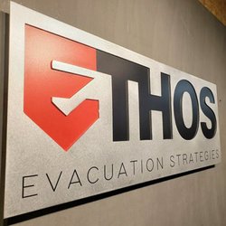 Custom Logo Signs - Two layer reverse cut sign with sanded aluminum front panel and colored metal backer
