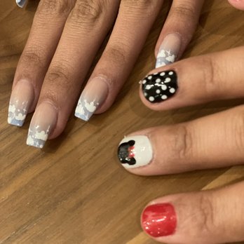 Polish Nails Spa - On the right is Disney inspired and left is acrylic with clouds theme. - Nail Salons Near Me - Santee, California Polish Nails Spa - On the right is Disney inspired and left is acrylic with clouds theme. - Nail Salons Near Me - Santee, California