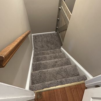 Jack Mair Contractor - Cat gate on basement stairs landing. - General Contractors Near Me